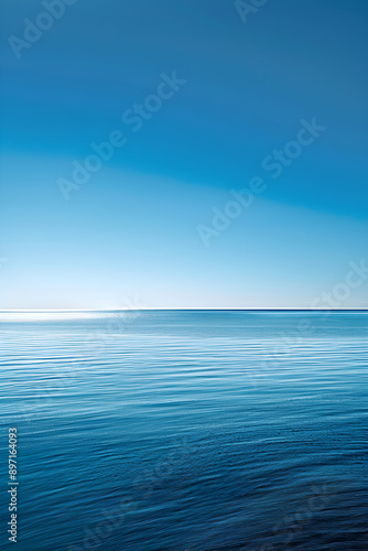 Tranquil Coastal Horizon: A Serene Landscape Capturing the Perfect Union of Sky and Sea © Saran