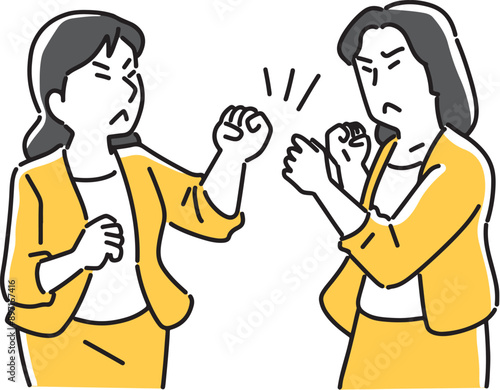 ファイティングポーズをとる2人の女性