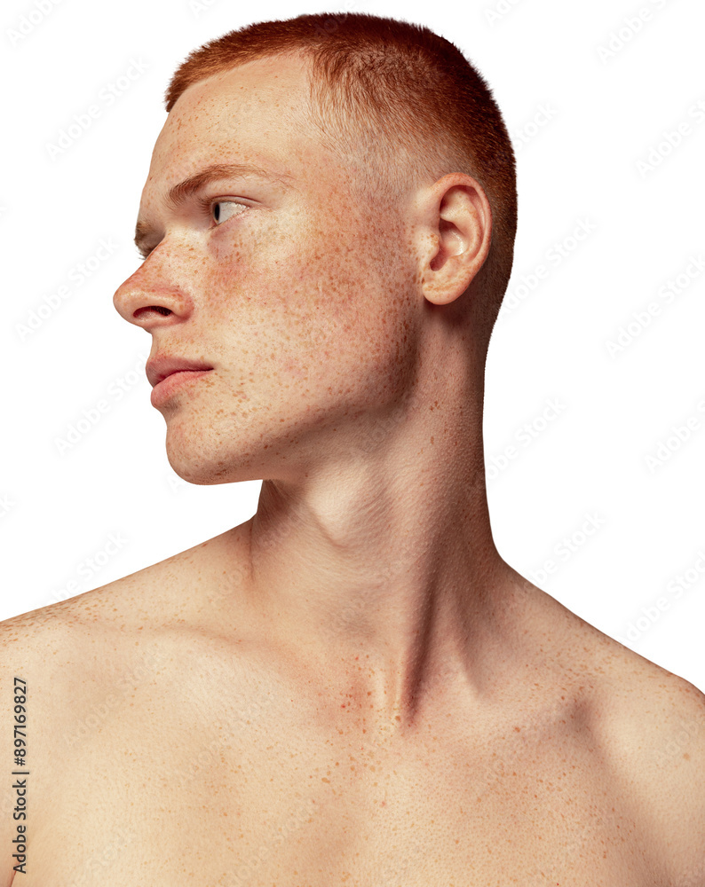 Obraz premium Close-up portrait of handsome young red-haired man posing against transparent background. Male natural beauty. Concept of men's health, posing, beauty, body and skin care. Model with freckles