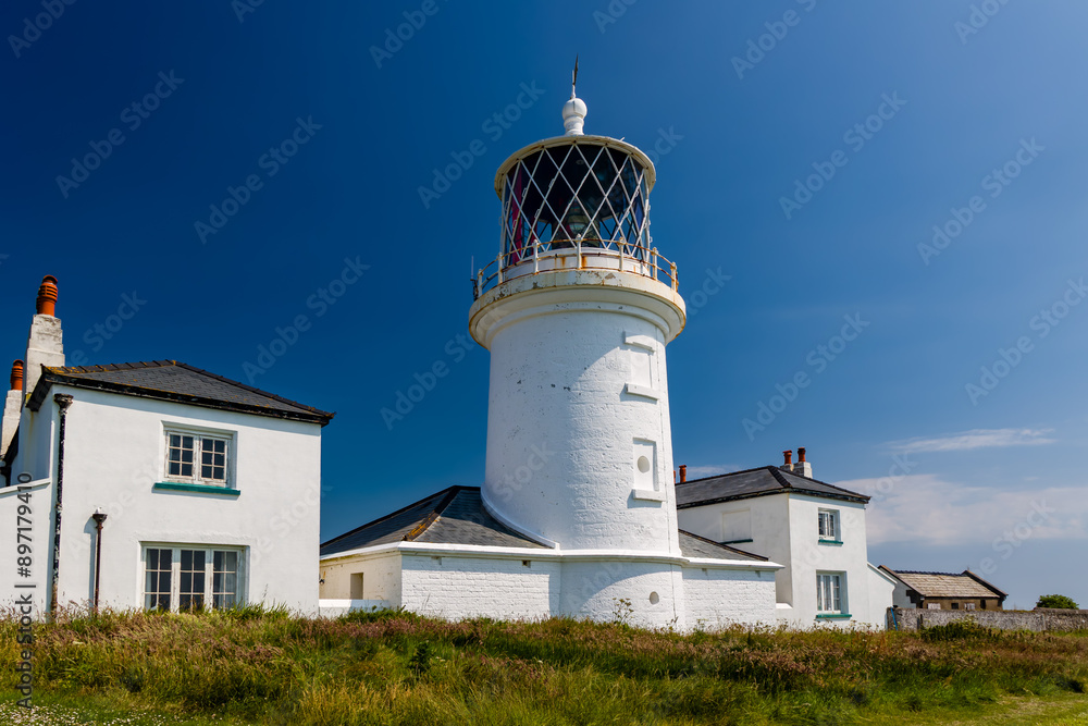 Circa 1800s lighthouse on Caldey Island near Tenby, Wales Circa 1800s lighthouse on Caldey Island near Tenby, Wales
