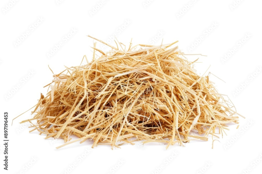 A pile of golden hay sits on a clean white surface, ideal for agricultural or rustic themed projects A pile of golden hay sits on a clean white surface, ideal for agricultural or rustic themed projects