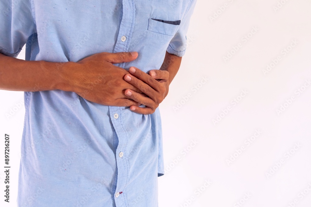 Man pressing on chest or suffering from chest pain. Heart attack symptom. Man pressing on chest or suffering from chest pain. Heart attack symptom.