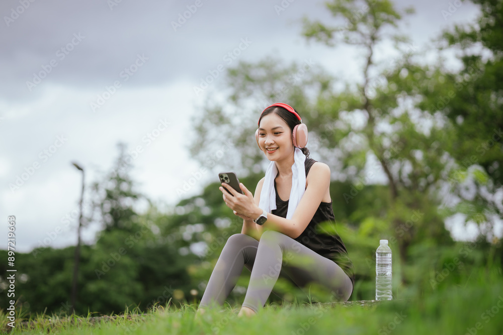 A beautiful young Asian woman, running in the city, embodies an active lifestyle. This joyful athlete, wearing sportswear and earphones, trains with energy and motivation, enjoying a healthy, powerful A beautiful young Asian woman, running in the city, embodies an active lifestyle. This joyful athlete, wearing sportswear and earphones, trains with energy and motivation, enjoying a healthy, powerful