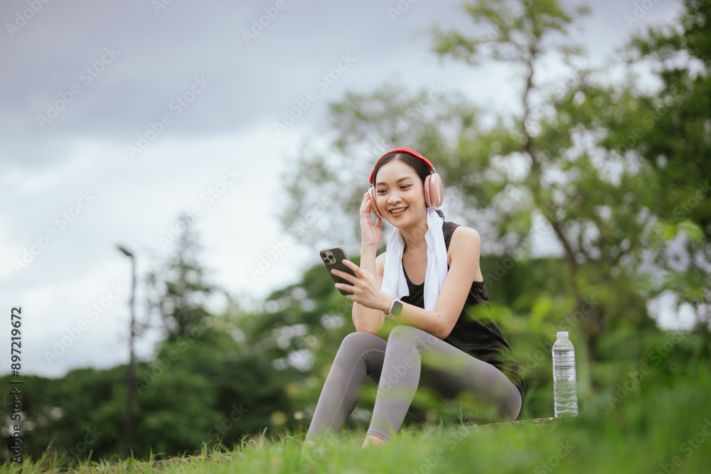 A beautiful young Asian woman, running in the city, embodies an active lifestyle. This joyful athlete, wearing sportswear and earphones, trains with energy and motivation, enjoying a healthy, powerful A beautiful young Asian woman, running in the city, embodies an active lifestyle. This joyful athlete, wearing sportswear and earphones, trains with energy and motivation, enjoying a healthy, powerful