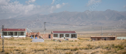 Houses at the foot of the mountain
