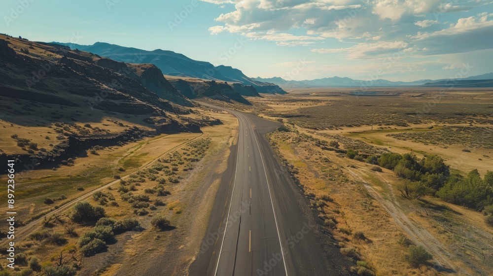 Naklejka premium aerial photography road , empty road aerial view , highway aerial view , breathtaking aerial view of an empty highway 