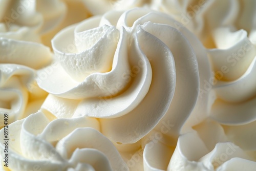 A detailed view of freshly whipped cream filling a bowl, with its creamy texture and smooth peaks, Individual peaks of whipped cream in a close-up shot, AI Generated