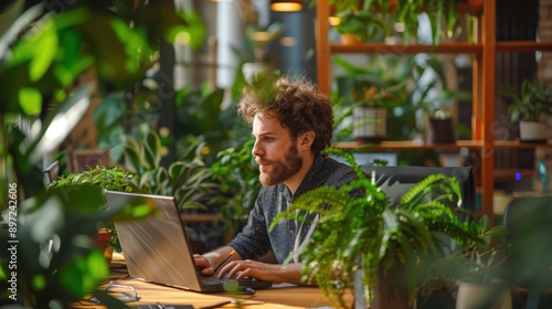 Enterprise developers coding sustainable software solutions in a green tech office, surrounded by plants and eco-friendly devices. No text, no logo, no trademarks © Benjawan