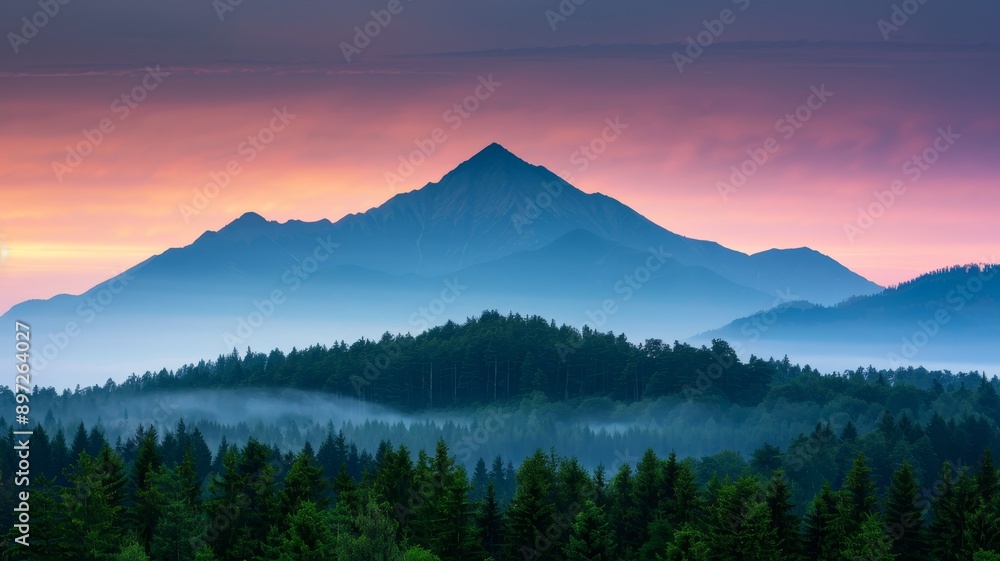 majestic mountain peak at dawn with foggy forest silhouette and vibrant pink and blue sky - stunning natural landscape photography majestic mountain peak at dawn with foggy forest silhouette and vibrant pink and blue sky - stunning natural landscape photography