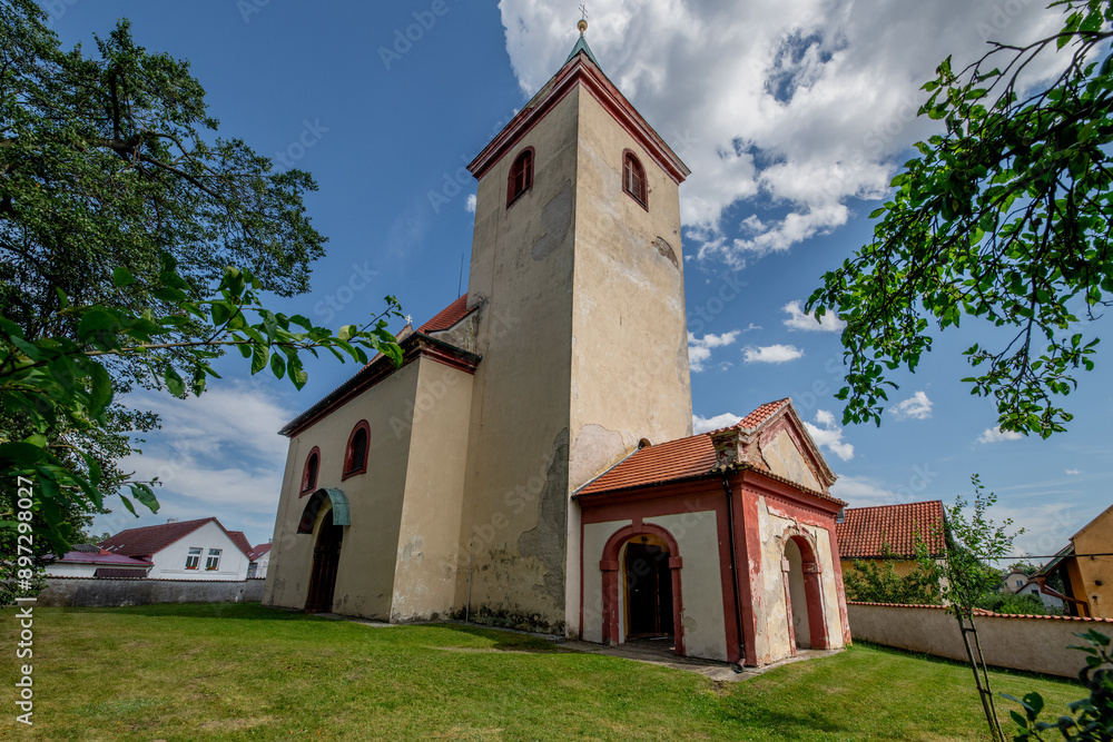 Church of St. Wenceslas - Hrusice (Czech Republic) - The originally Romanesque church was later rebuilt in Baroque style, but the remarkable Romanesque portal has been preserved.