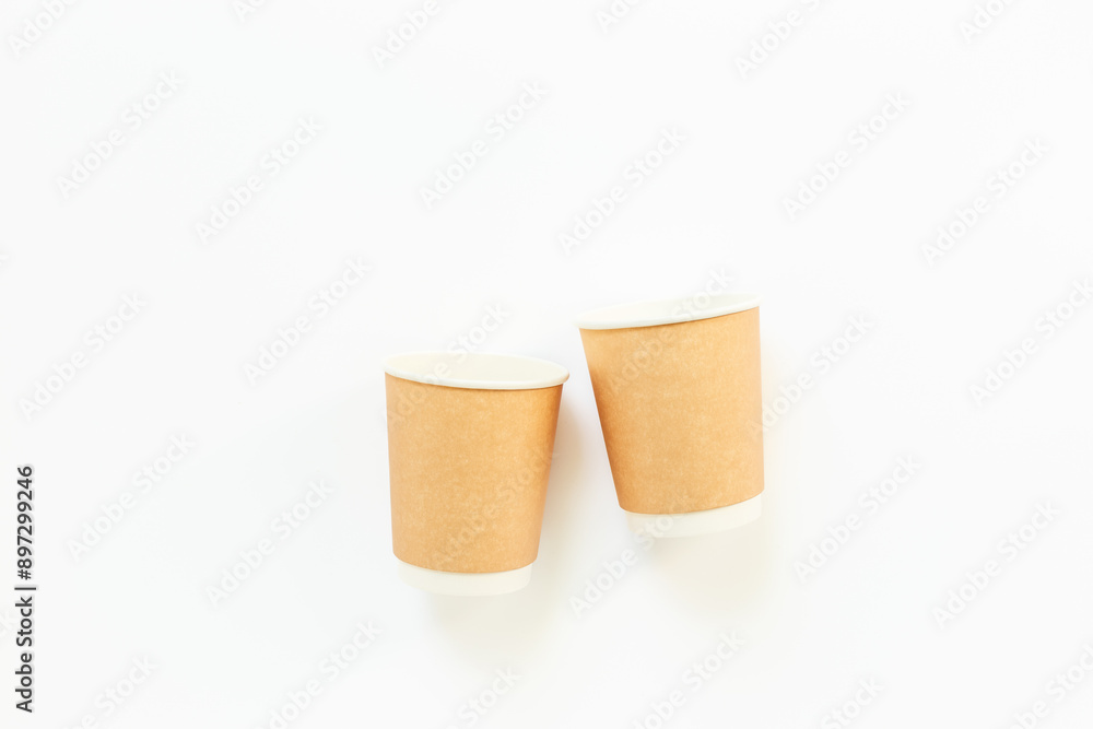 Disposable paper coffee cups, top view. Eco-friendly zero waste products Disposable paper coffee cups, top view. Eco-friendly zero waste products