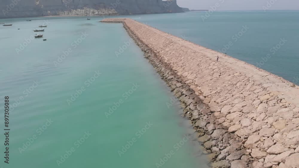 Gwadar is a port city on the southwestern coast of the Pakistani province of Balochistan. The city is located on the shores of the Arabian Sea, opposite Oman and has a population of over 90,000. Gwadar is a port city on the southwestern coast of the Pakistani province of Balochistan. The city is located on the shores of the Arabian Sea, opposite Oman and has a population of over 90,000.