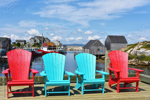 Chairs in a row at the fishing Village of Peggy's Cove, Nova Scotia