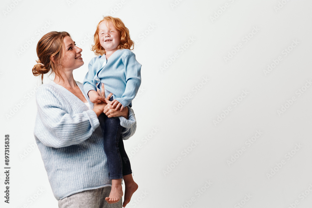 Mother and daughter bonding moment in flight on a white background for family travel and joyful moments collection Mother and daughter bonding moment in flight on a white background for family travel and joyful moments collection