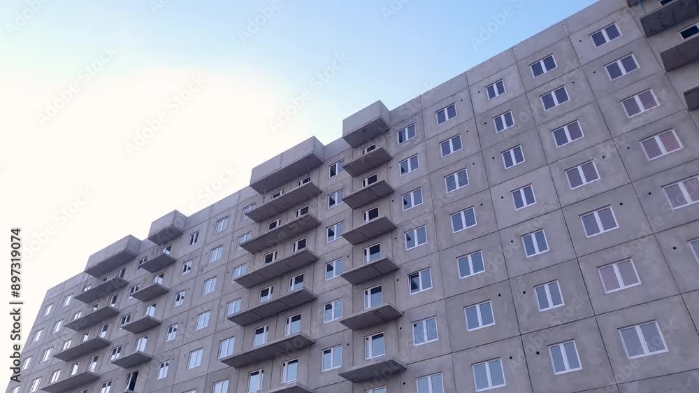 View of Construction of concrete slab apartment building, construction of ...