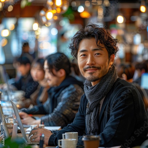 A Diverse Team of Japanese IT Professionals Collaborating in a Modern Office with Advanced Technol