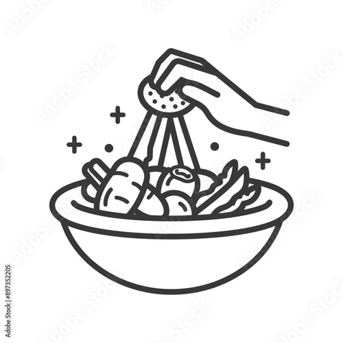 Hand Sprinkling Water Over Vegetables in Bowl