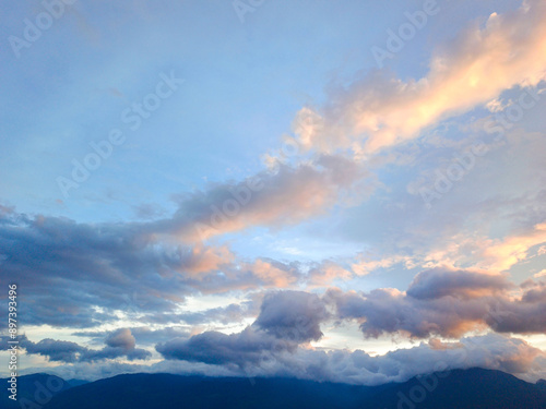 Beautiful sunset orange sky with clouds combined with blue sky