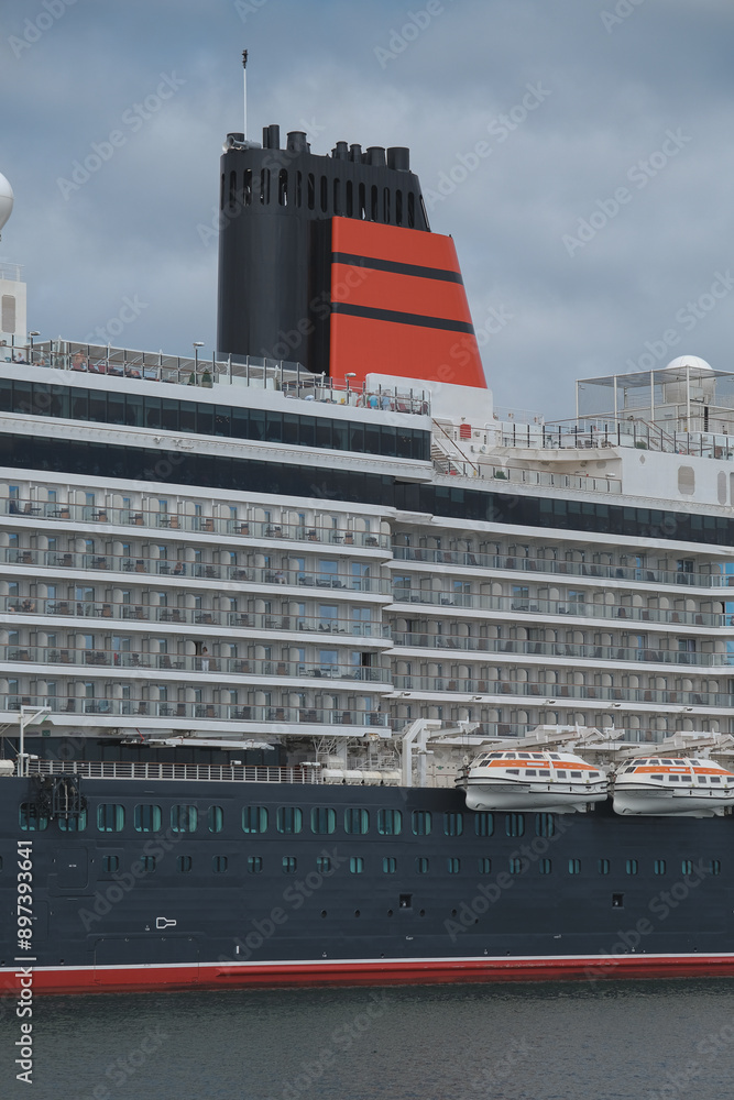 Obraz premium Brand new cruiseship cruise ship ocean liner Queen Anne in port of Skagen, Denmark during inaugural season in Europe