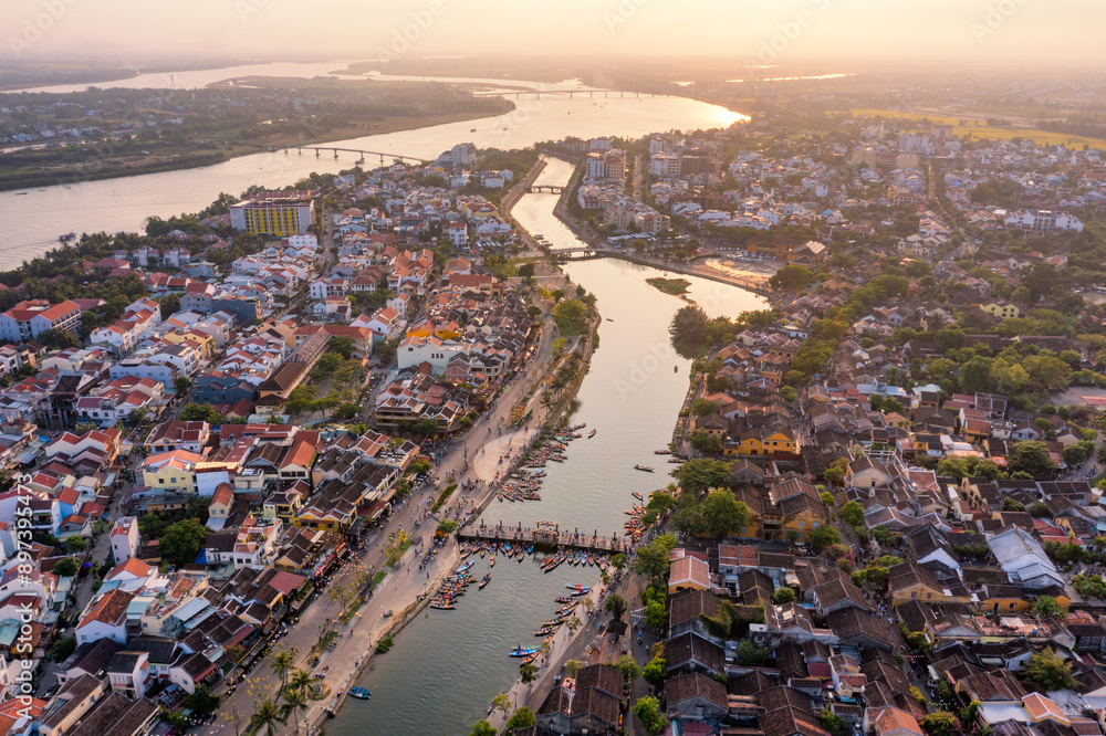 Fototapeta premium Aerial drone view of Hoi An city, Vietnam. Ancient town, UNESCO world heritage, at Quang Nam province.