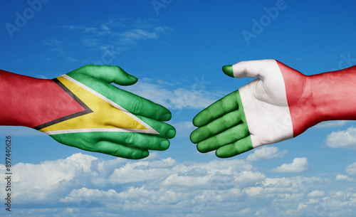 Italy and Guyana country handshaking with flags, consensus concept international co-operation illustration