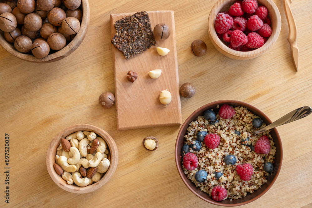 Healthy lunch background, bowl with quinoa, berry and nuts Healthy lunch background, bowl with quinoa, berry and nuts