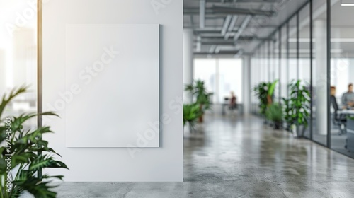 Stock image of an office interior with a clear white wall and a potted plant, displaying a modern clean design. © DZMITRY