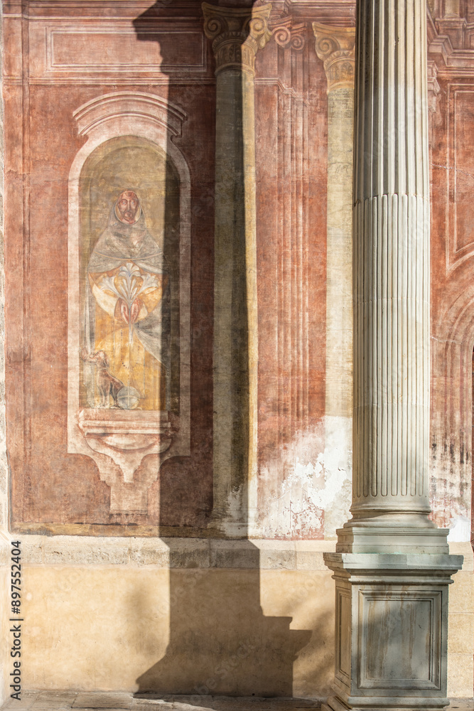 Obraz premium Historical Mural and Pillar in Iglesia de Santo Domingo, Granada
