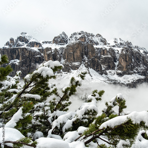 Wallpaper Mural June's Icy Embrace: Sellagruppe Corvara Swathed in Snow, Hidden in Clouds and Mists Torontodigital.ca