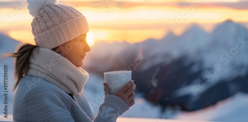 Woman in Snowy Mountains at Sunset