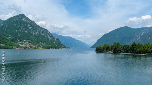 Scenic Serenity: Lago d'Idro Surrounded by Rugged Mountain Peaks