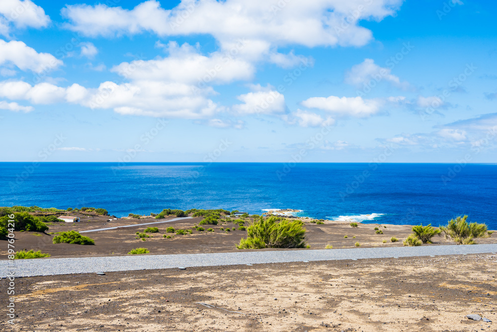 Fototapeta premium View of ocean at Capelinhos peninsula with volcanic landscape, Faial island, Azores, Portugal