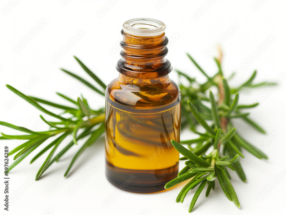 Rosemary essential Oil on white background surrounded by rosemary sprigs Rosemary essential Oil on white background surrounded by rosemary sprigs