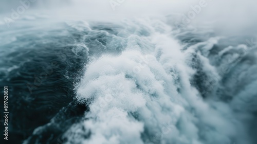 A dynamic capture of whitewater rapids in a misty river landscape, showcasing the turbulent and energetic flow of water, framed by the misty environment in the backdrop.