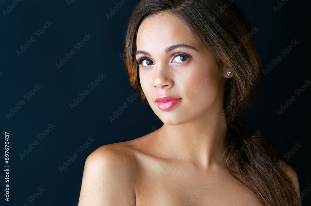 Beauty, makeup and confident portrait of woman in studio with smile, mockup or healthy skin glow. Skincare, dermatology and face of girl with luxury cosmetics, pride or shine on dark background space Beauty, makeup and confident portrait of woman in studio with smile, mockup or healthy skin glow. Skincare, dermatology and face of girl with luxury cosmetics, pride or shine on dark background space