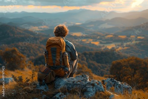 Wallpaper Mural Solo Backpacker Contemplates Mountain View at Sunset Torontodigital.ca