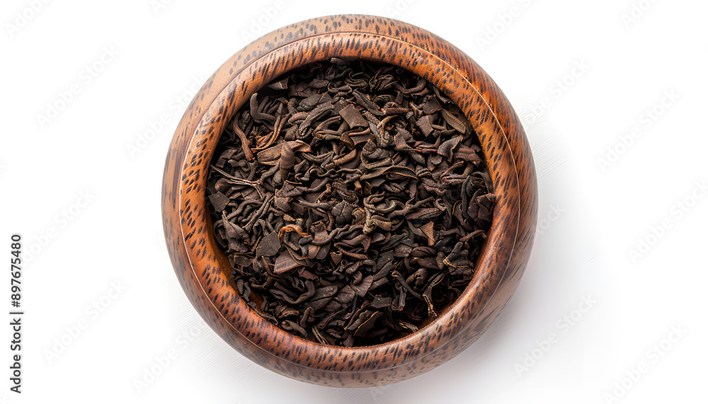 Bowl of traditional Chinese pu-erh tea leaves isolated on white, top view Bowl of traditional Chinese pu-erh tea leaves isolated on white, top view