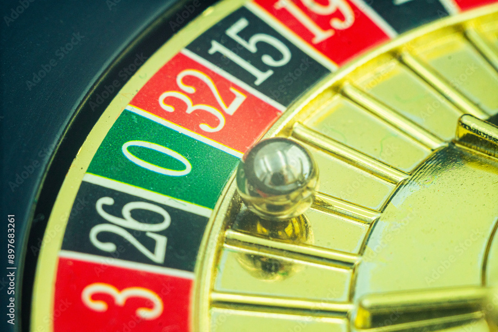 Close up shot of a spinning roulette. Presentation of a luxury casino roulette wheel with a yellow spinning fireball. Polished, elegant roulette with golden elements in Las Vegas. Close up shot of a spinning roulette. Presentation of a luxury casino roulette wheel with a yellow spinning fireball. Polished, elegant roulette with golden elements in Las Vegas.