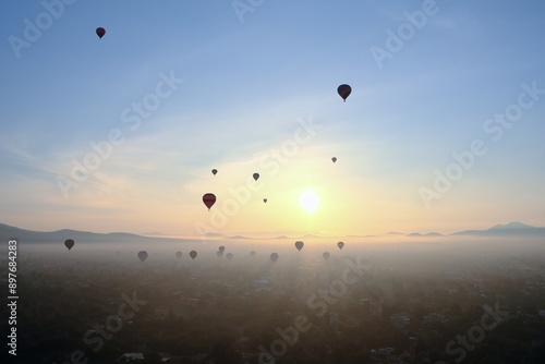 Hot Air Balloons Over Misty Teotihuacan Landscape At Sunrise, Mexico City