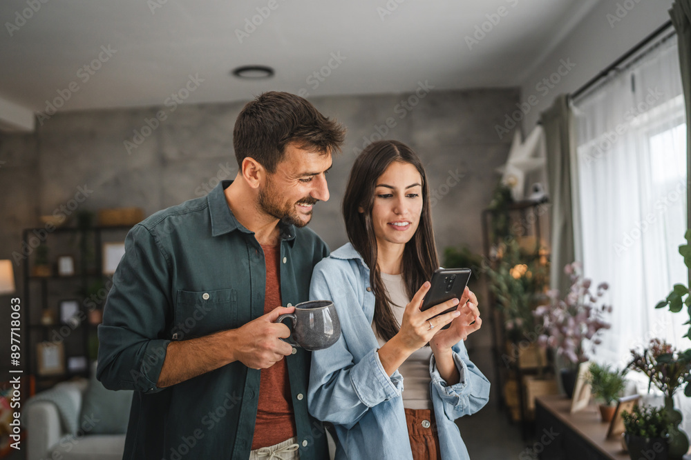 Portrait of girlfriend show mobile phone screen to her boyfriend Portrait of girlfriend show mobile phone screen to her boyfriend