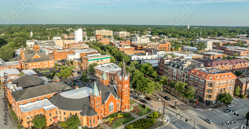 Obraz na płótnie Aerial view of Fayetteville North Carolina downtown business district, main street in Cumberland county First Baptist Church. government buildings w salonie