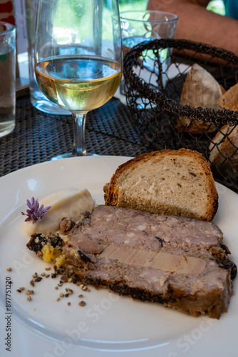 Terrine foie gras fat liver specialty food product made of liver of a duck or goose fattened by force feeding, served in French restaurant in Perigoed, Dordogne, close up
