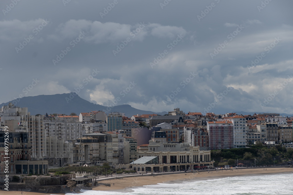 Obraz premium Panoramic view on cliffs, houses, sandy beaches of touristic Biarritz city, Basque Country, Bay of Biscay of Atlantic ocean, France