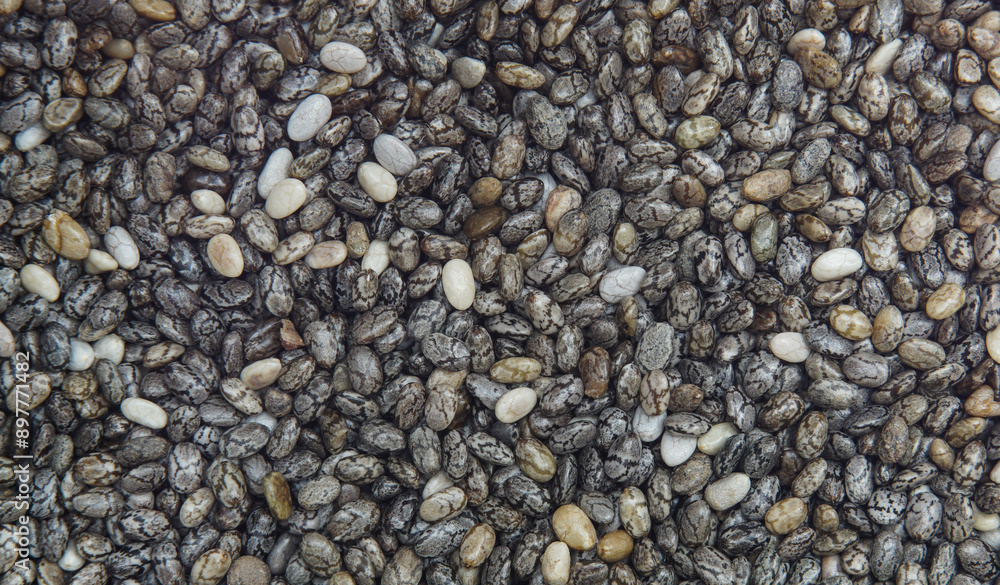 Close up view from above of Chia seeds. Top view of dry chia seeds Close up view from above of Chia seeds. Top view of dry chia seeds