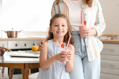 Happy little girl and mothe...