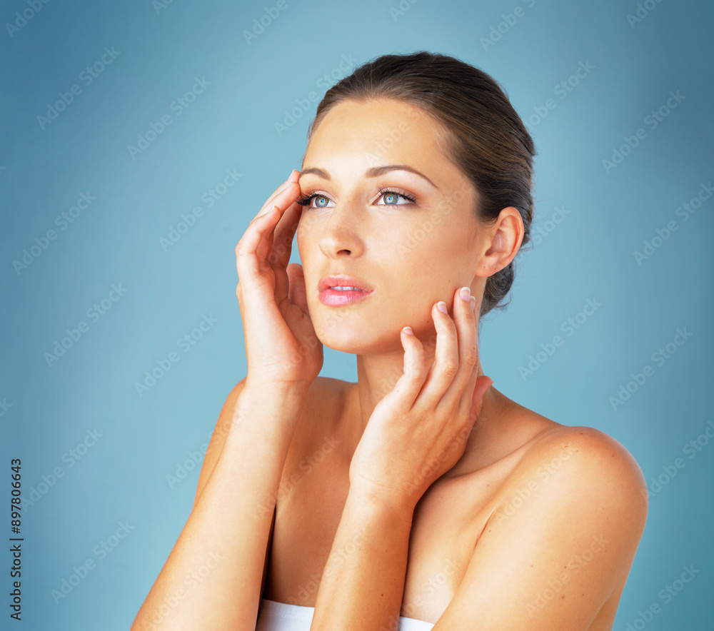 Woman beauty, thinking and soft in studio, skincare and confident feminine on blue background. Female person, facial treatment and foundation shine for smooth skin, cosmetics and plan for dermatology Woman beauty, thinking and soft in studio, skincare and confident feminine on blue background. Female person, facial treatment and foundation shine for smooth skin, cosmetics and plan for dermatology