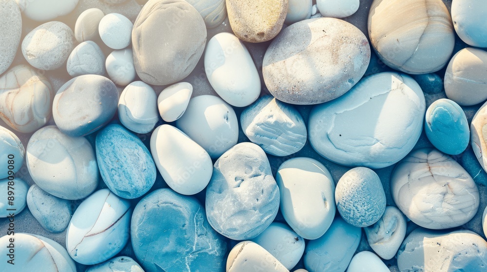 The beach is adorned with a stunning array of colorful and textured pebbles, creating a peaceful and harmonious scene The beach is adorned with a stunning array of colorful and textured pebbles, creating a peaceful and harmonious scene