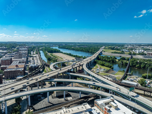 Aerial view of complex highway intersection in Richmond with multiple overpasses connecting I-95 to downtown and the riverfront
