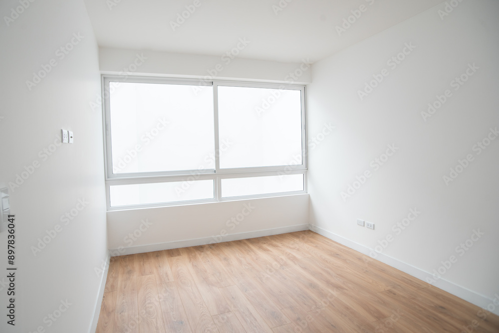 Fototapeta premium habitacion de departamento con grandes ventanas