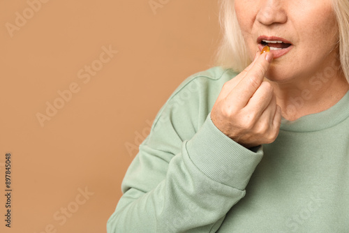 Beautiful mature woman taki...